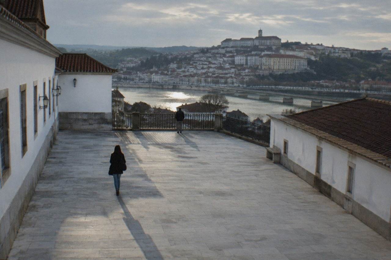 The University of Coimbra buildings seen from the lower town across the River Mondego