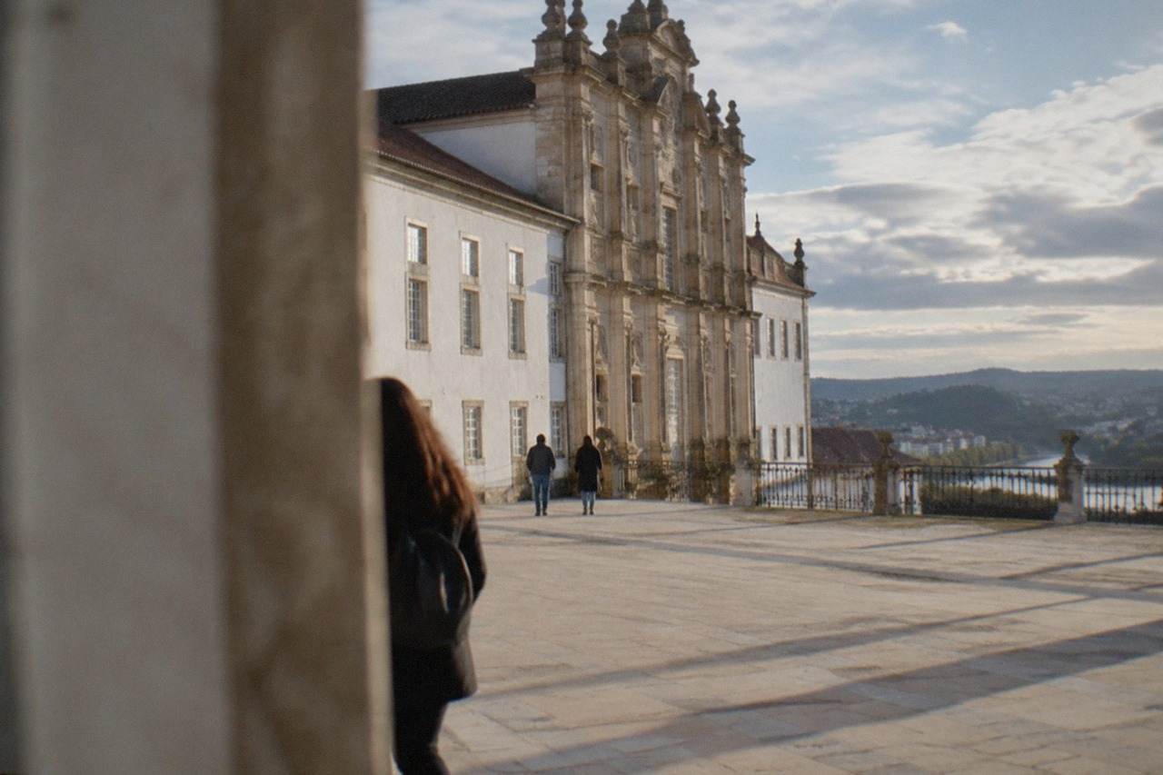 The grand baroque facade of the University of Coimbra buildings on the university hill above the city