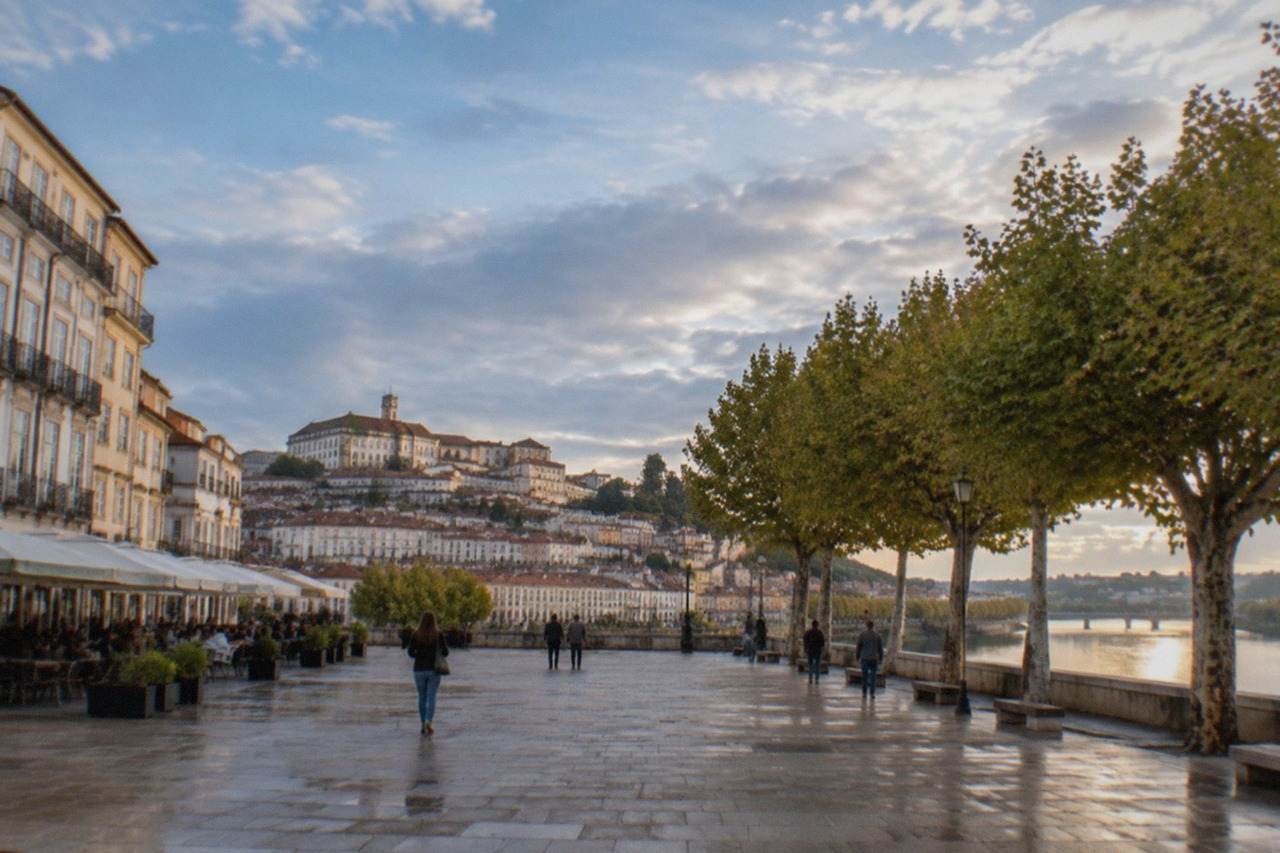 The old university hill of Coimbra seen from the River Mondego in Portugal