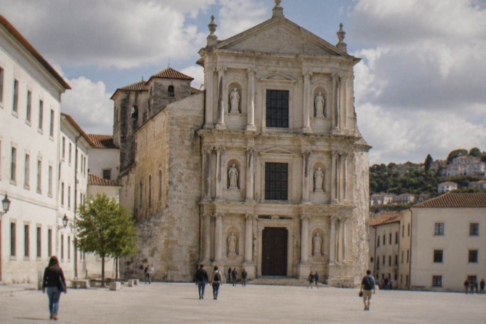Sunlight on the stone walls of the New Cathedral in Coimbra
