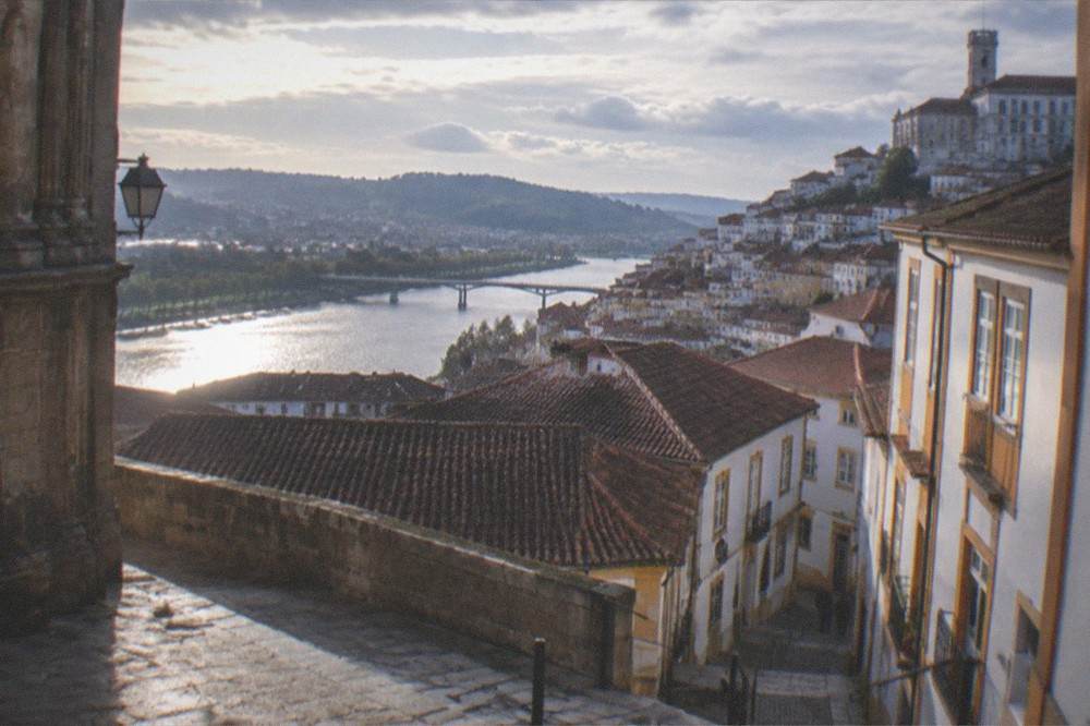 A view over the rooftops of Coimbra toward the River Mondego from near the old cathedral