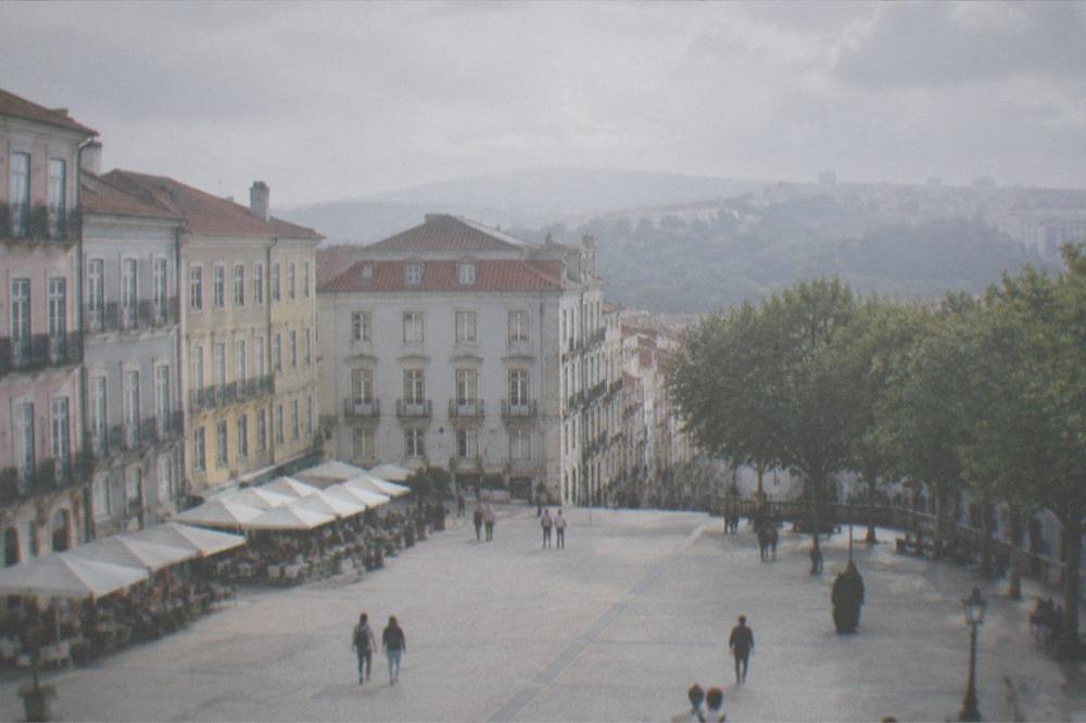 The college facades of Rua da Sofia in Coimbra seen along the street below the university hill