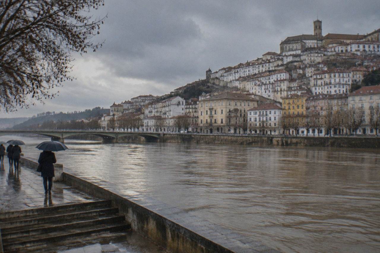 The old town of Coimbra, Portugal, seen from across the River Mondego on a cool winter afternoon
