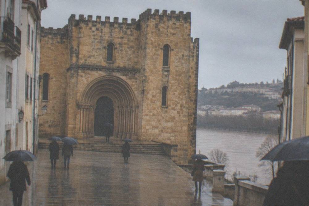The Romanesque doorway of the Sé Velha, Coimbra's old cathedral, on an overcast day