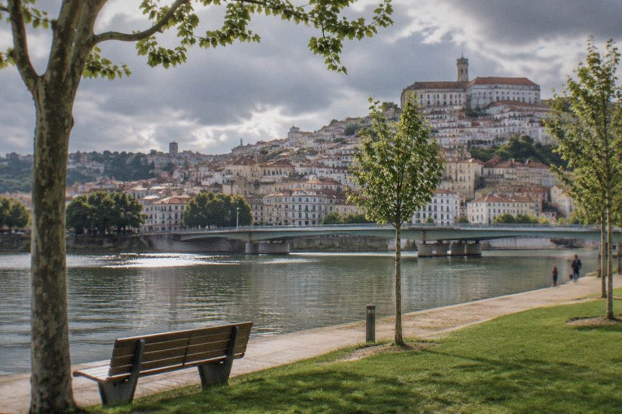 The hillside city of Coimbra, Portugal, with the university buildings above the River Mondego