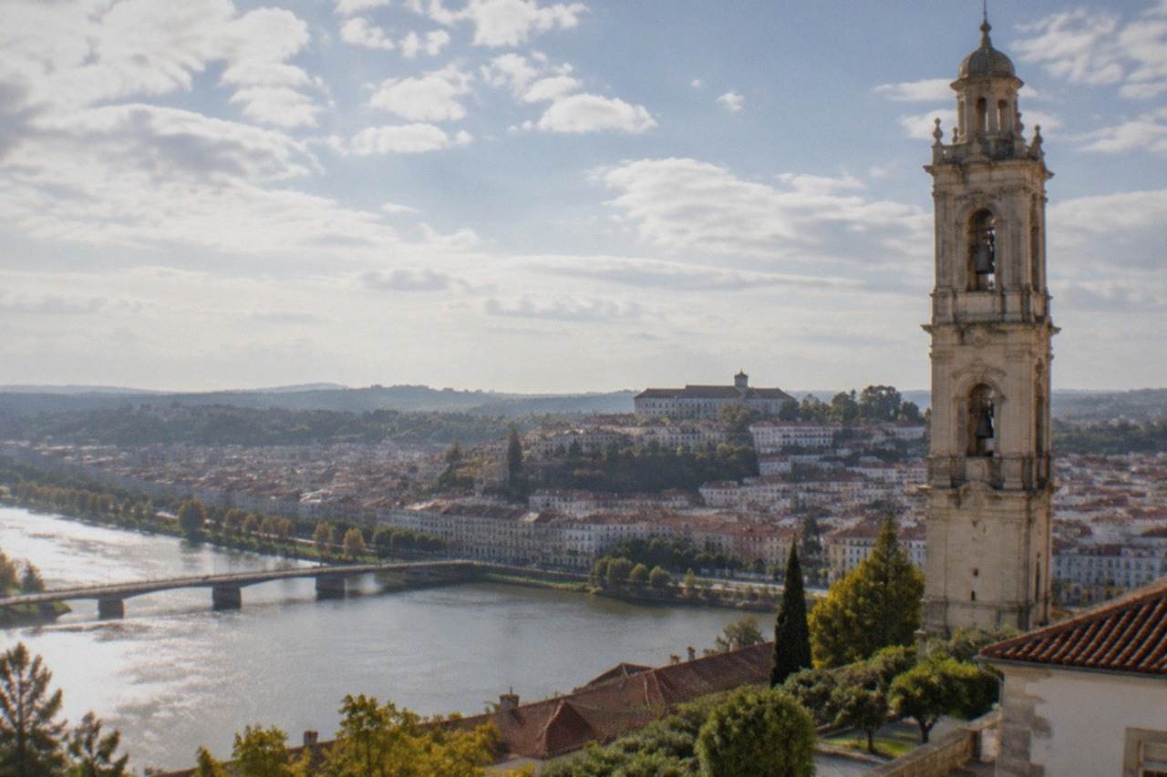 View over Coimbra's old town with the university tower above the River Mondego