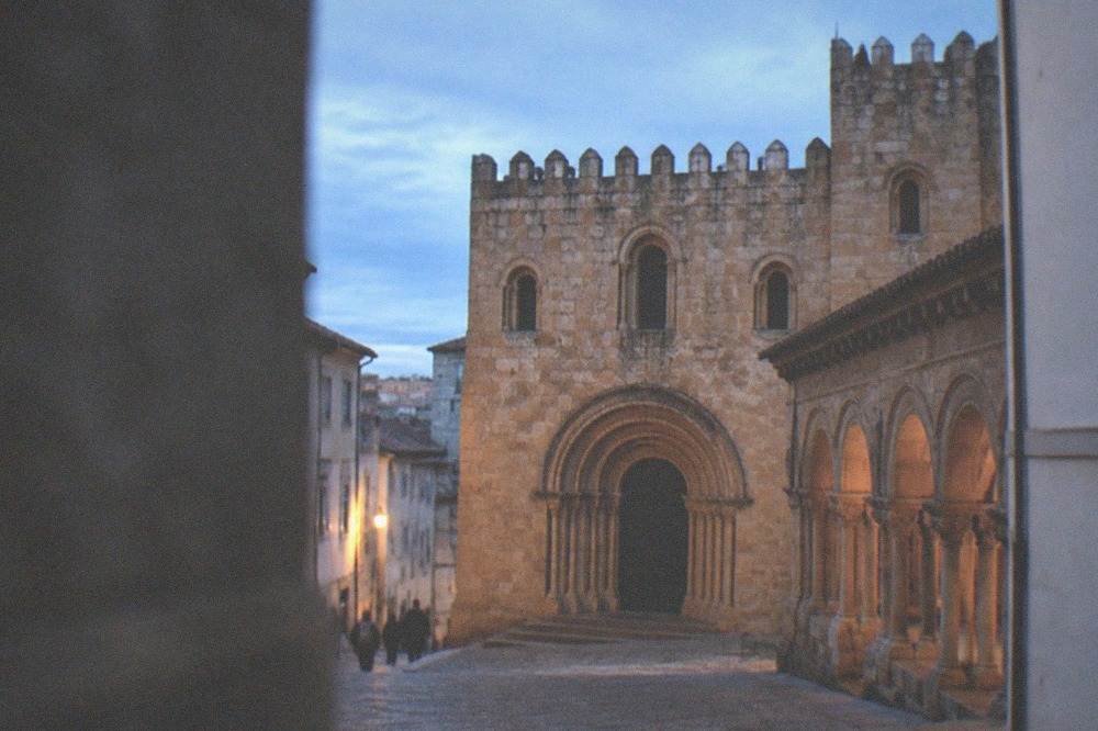 The Romanesque doorway and cloister arches of Coimbra's old cathedral