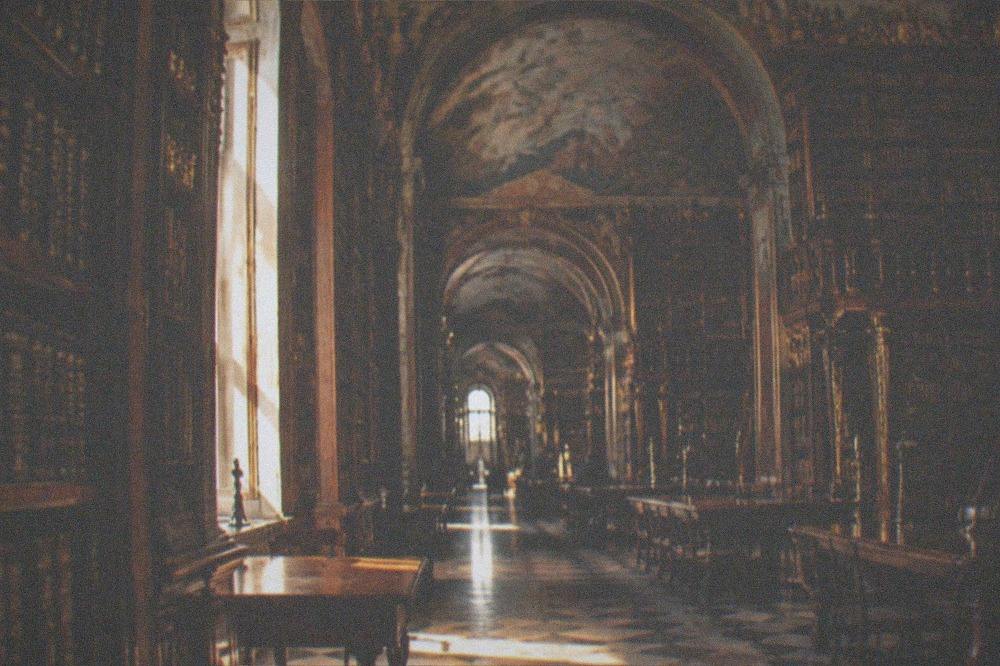 The baroque library interior of the Joanina Library at the University of Coimbra