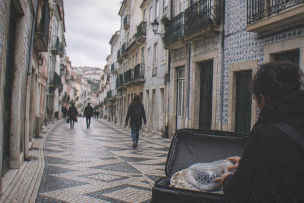 A wrapped ceramic purchase packed carefully inside a suitcase