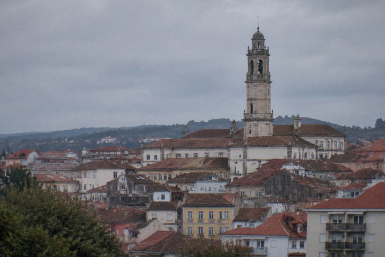 View over Coimbra's old town with the university tower rising above red rooftops