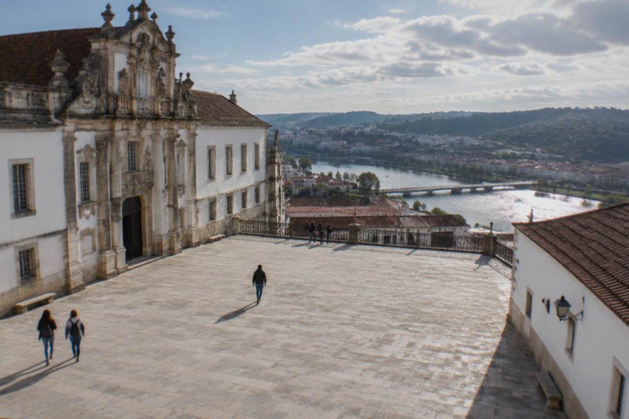 The ornate baroque facade of the University of Coimbra buildings on the hill above the River Mondego