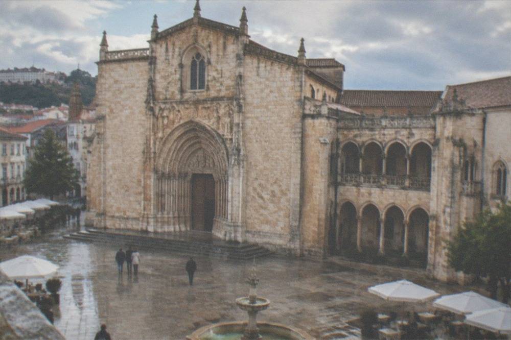 The ornate carved portal and cloister of the Mosteiro de Santa Cruz in central Coimbra